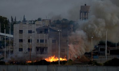 Tel Abyad’da terör örgütüne ait bez parçaları ve posterler kaldırılıyor