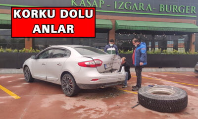 Kamyonun lastiği fırlayıp park halindeki otomobile çarptı