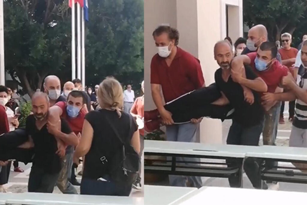 Engelli genci kucaklarında koşarak sınava yetiştirdiler