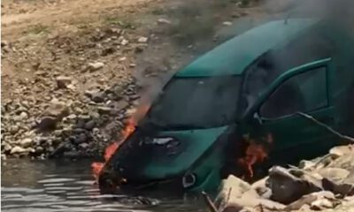 Alev alev yanan araç dere yatağına düştü